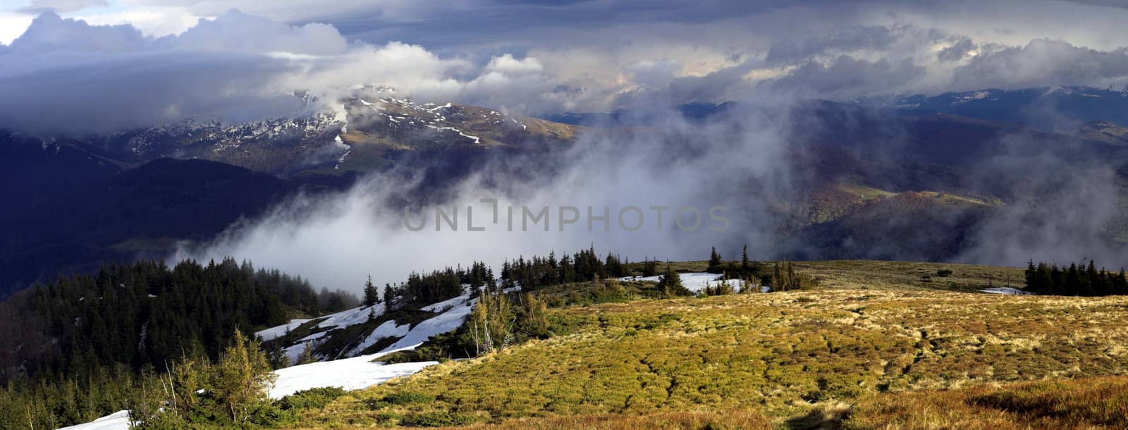 Mountain panorama with clouds by utyf