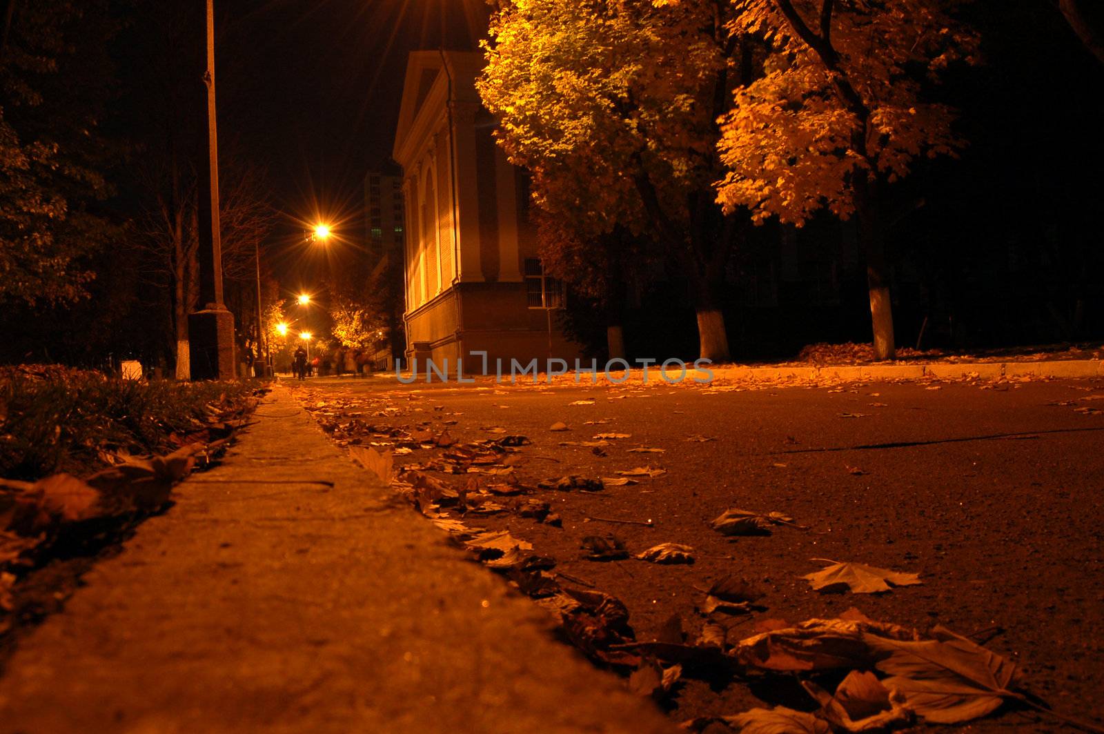 One warm autumn night at light of city lanterns