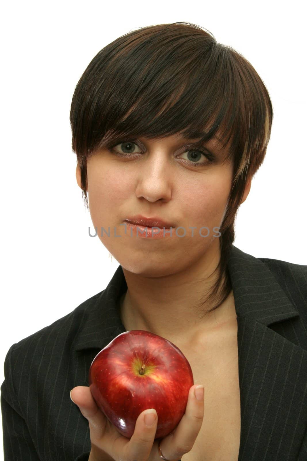 The young girl with a red apple, isolated on white