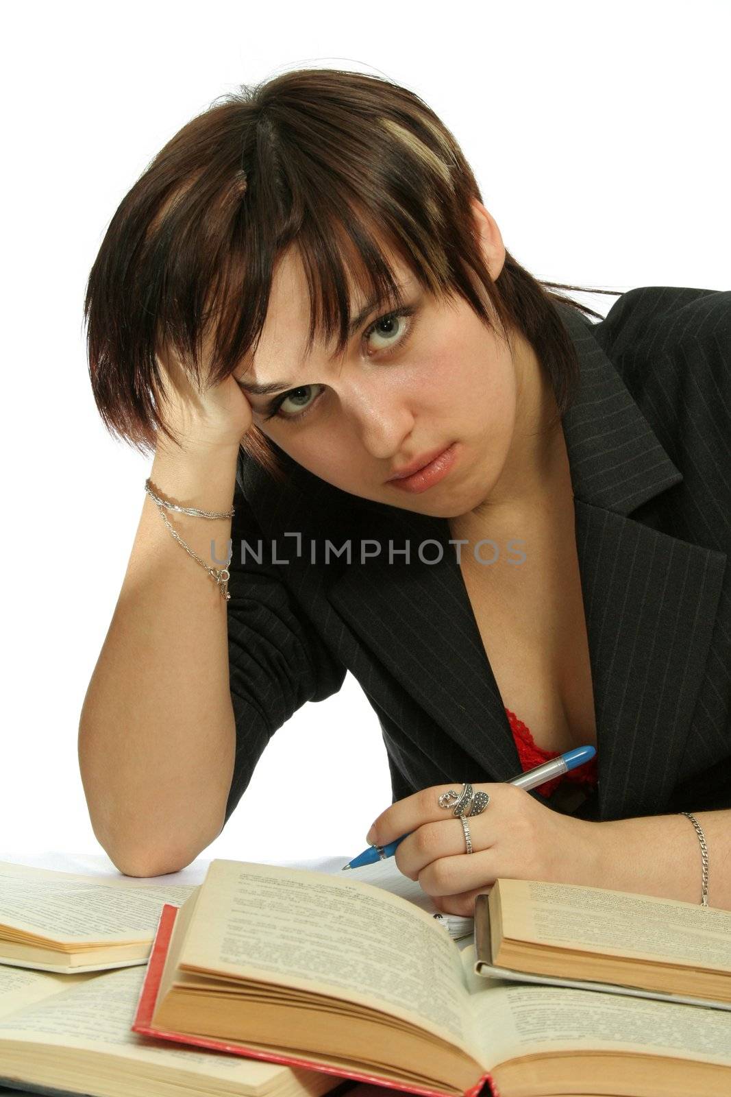 The young girl with books, isolated on white