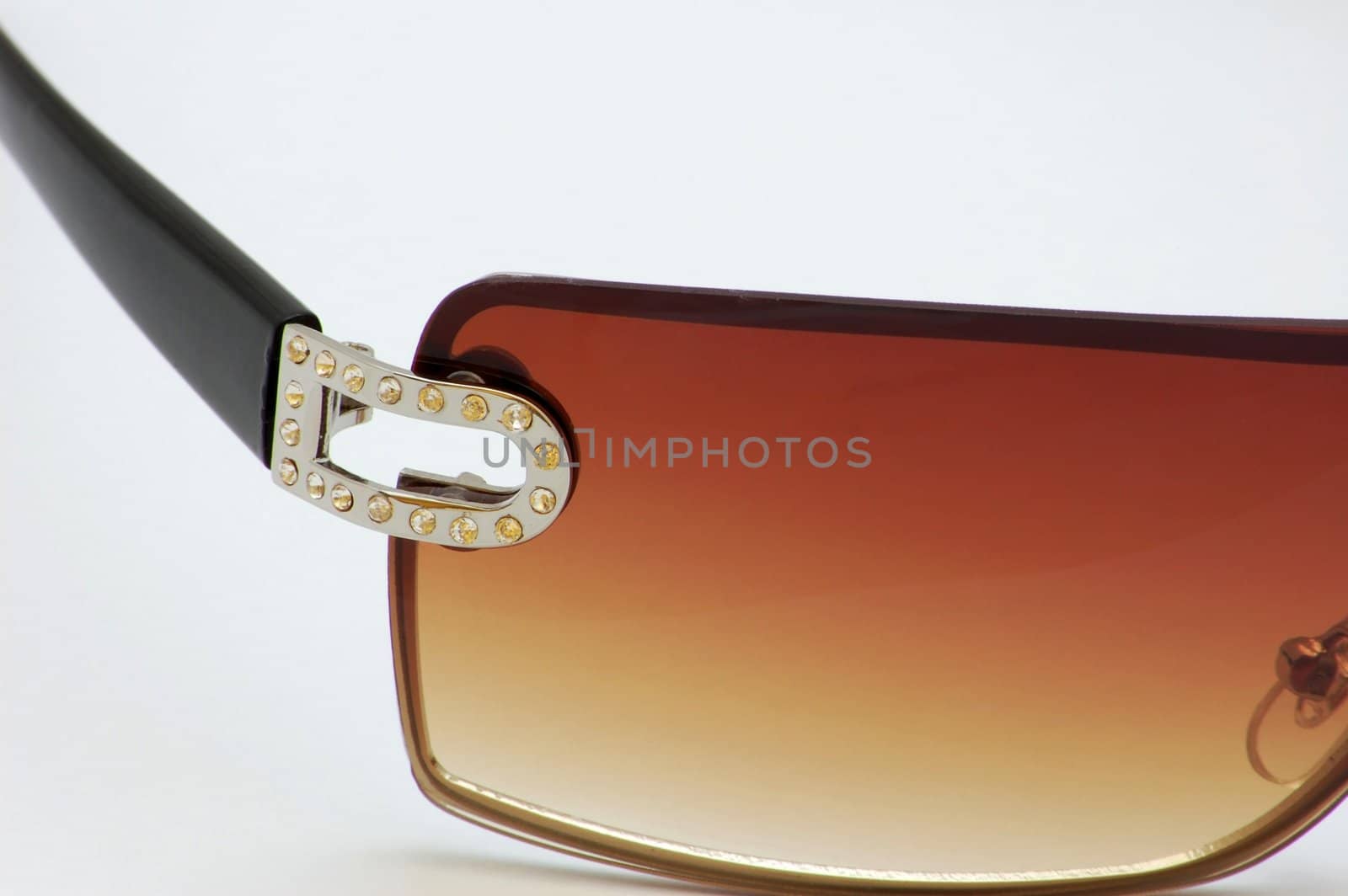 brown sunglasses isolated on the background