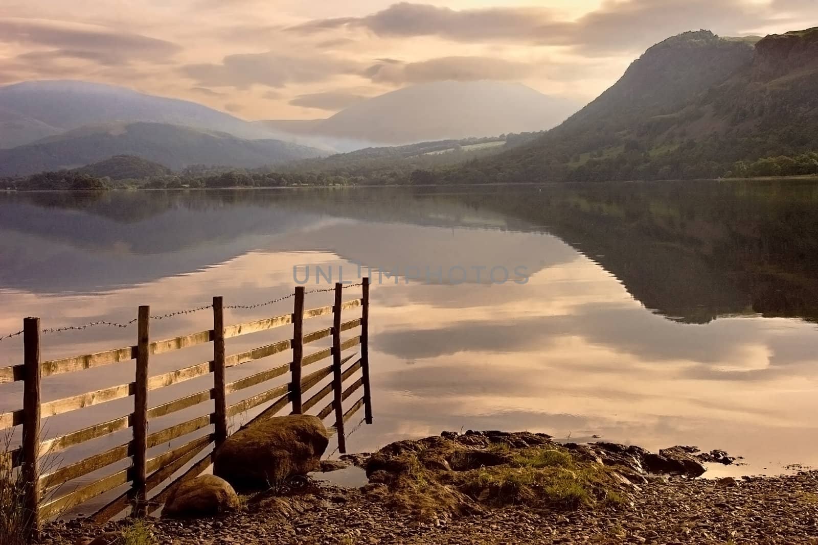 The still waters of Derwent Water soon after daybrake.