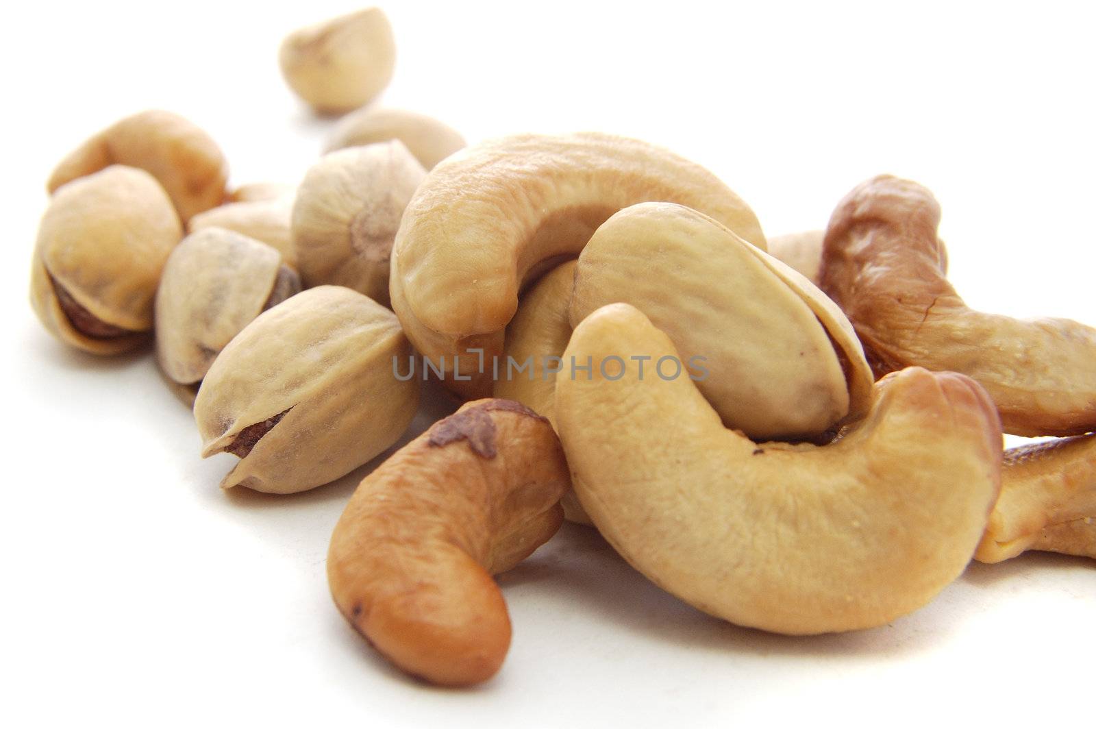 Various nuts on the white background