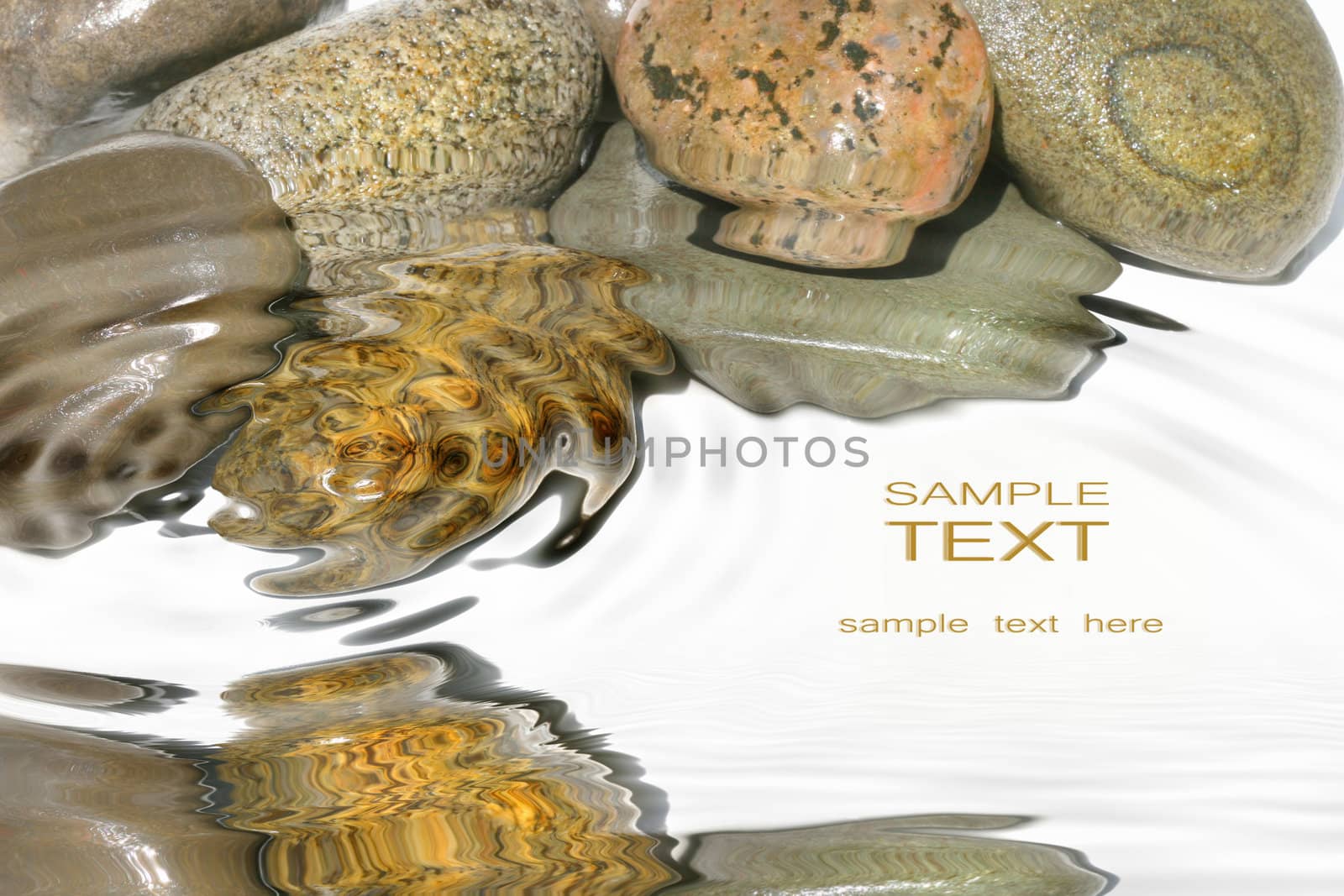 Wet rocks against white background