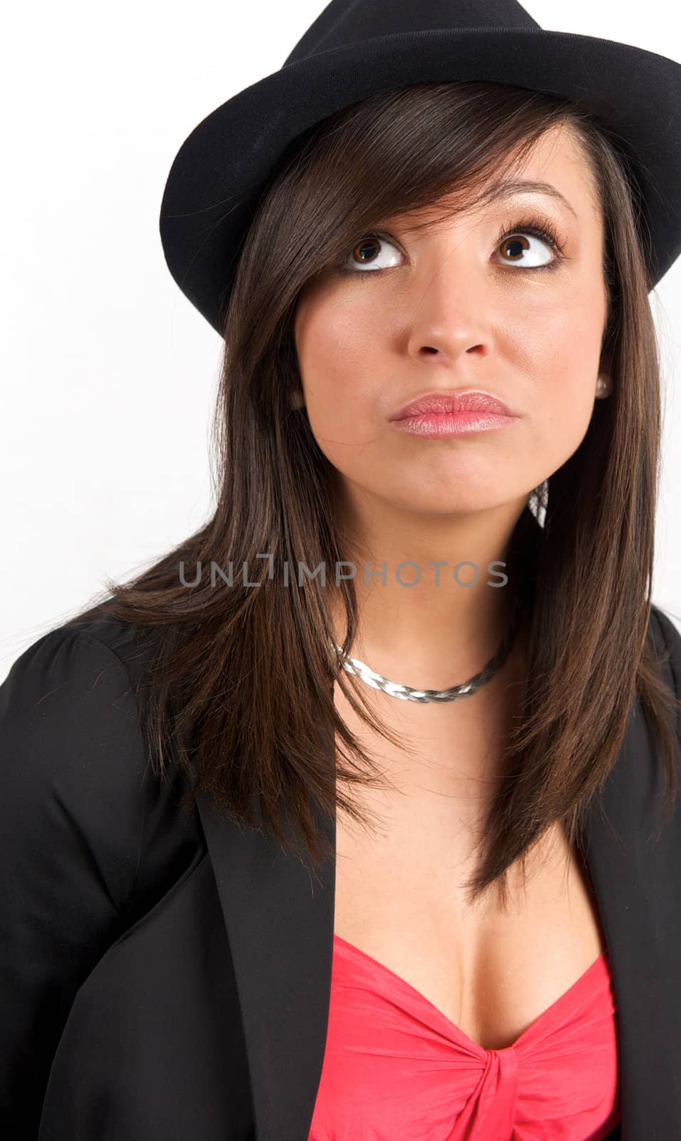 Pretty young woman posing in a studio with a nice black clothes