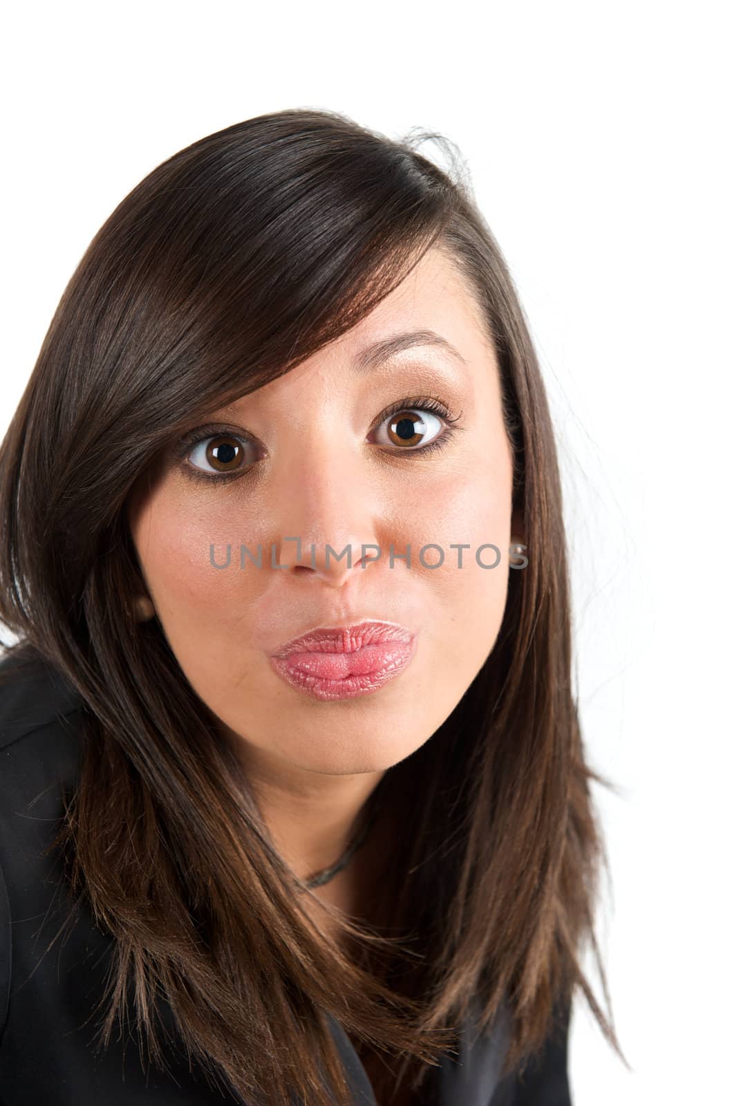 Pretty young woman posing in a studio with a nice black clothes