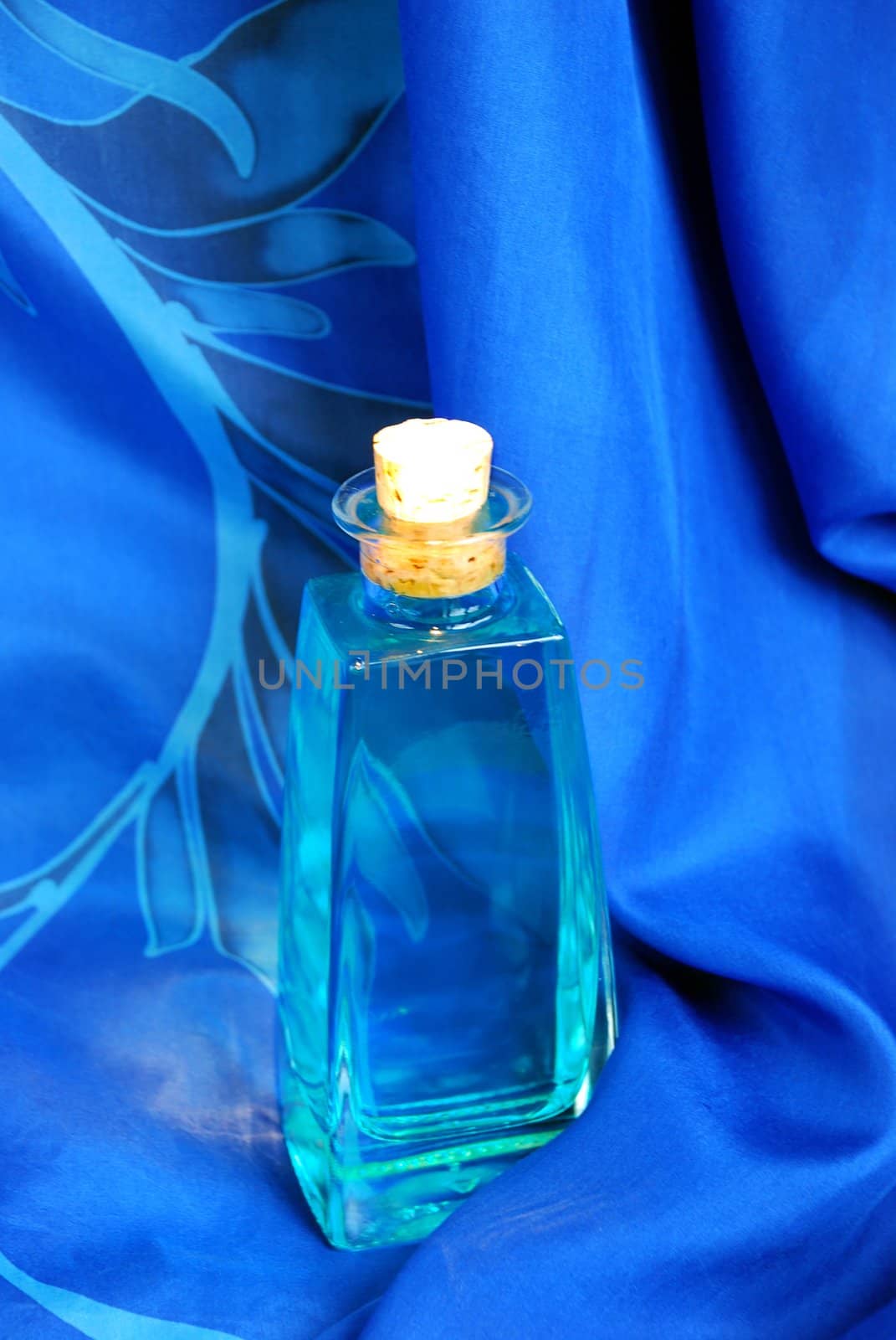 Blue bottle of shampoo close up