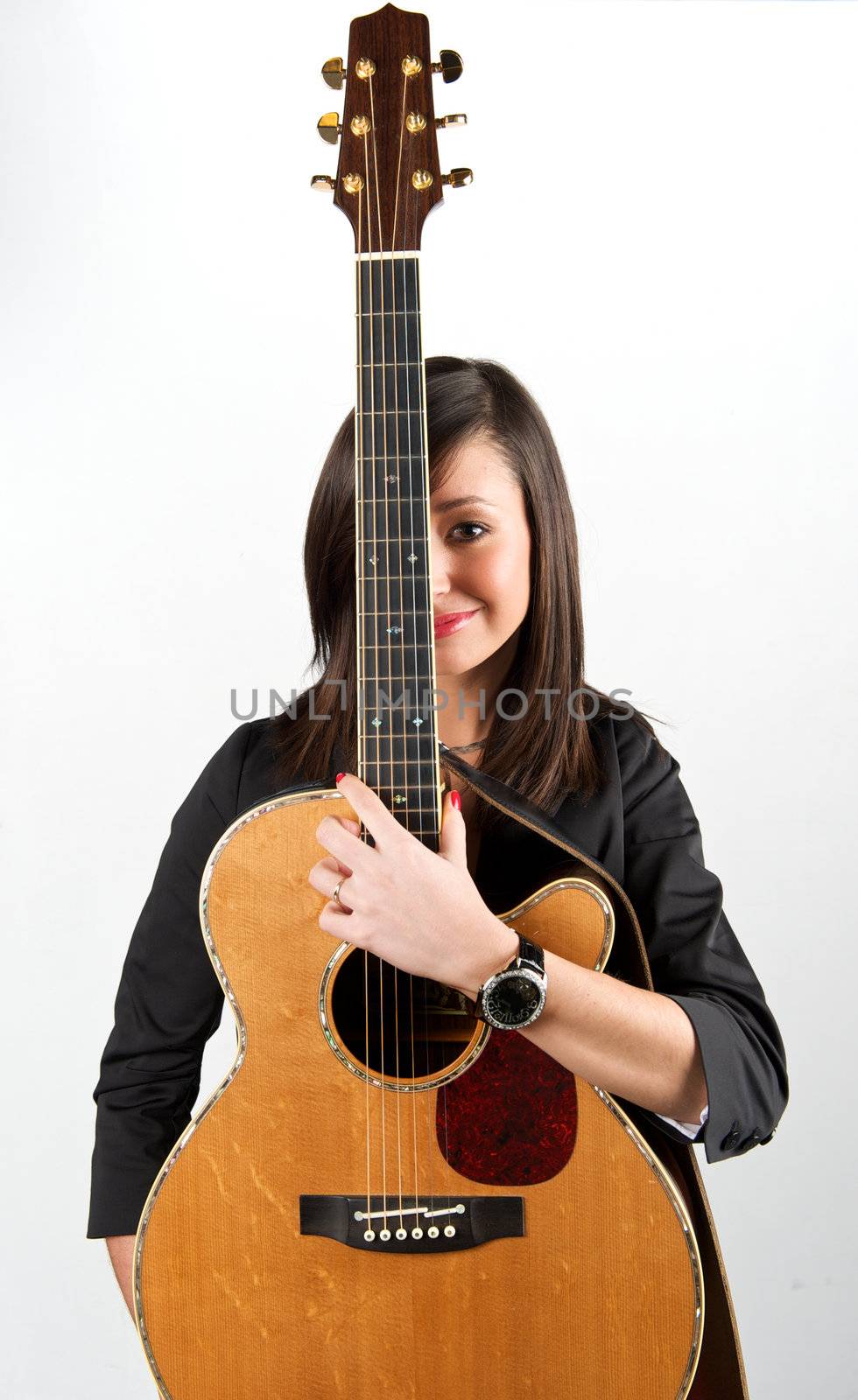 Pretty woman playing with guitar