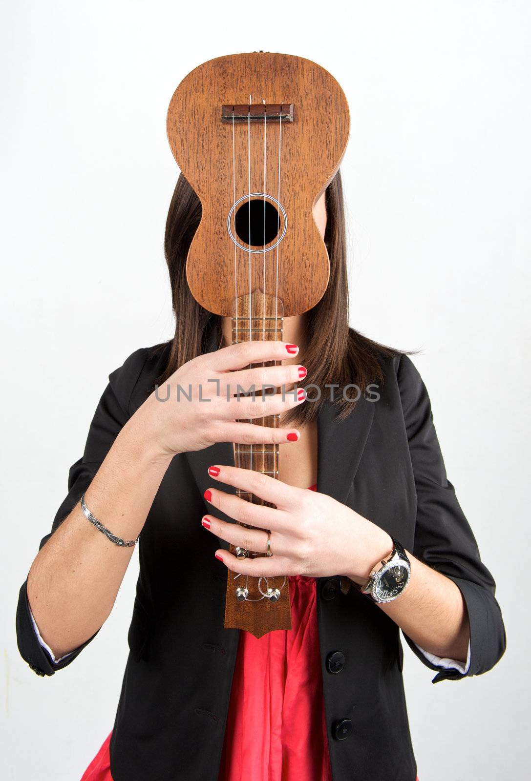 Pretty woman playing with guitar