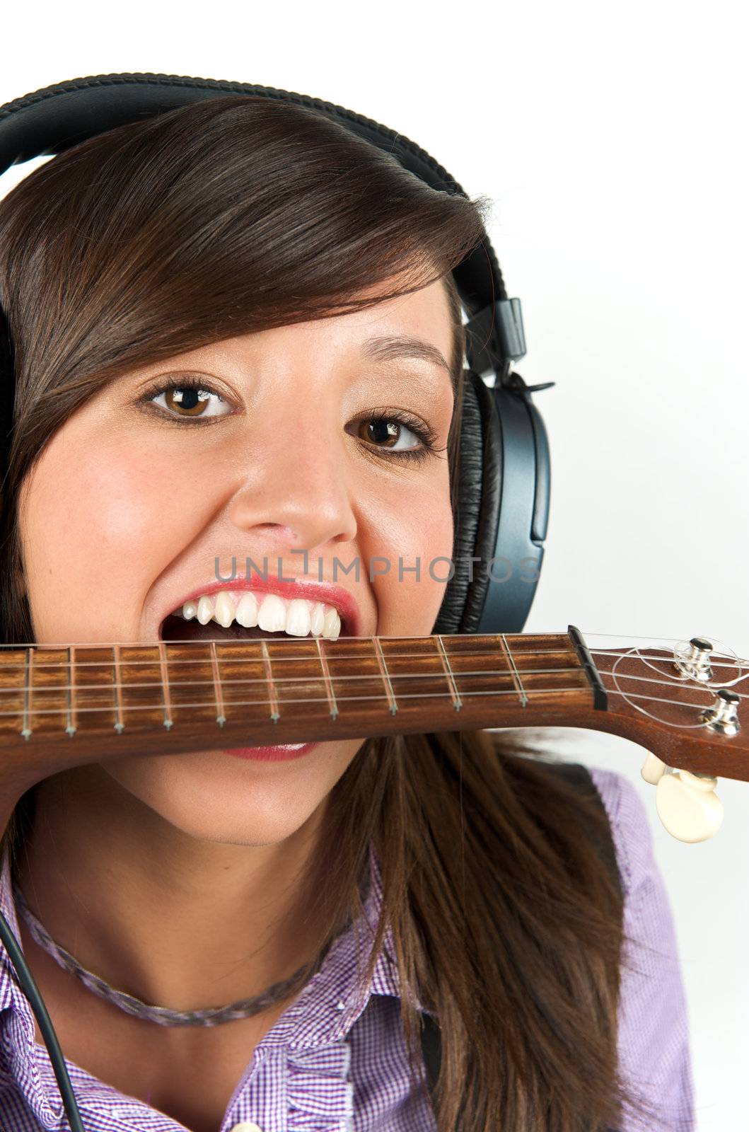 Pretty woman playing with guitar