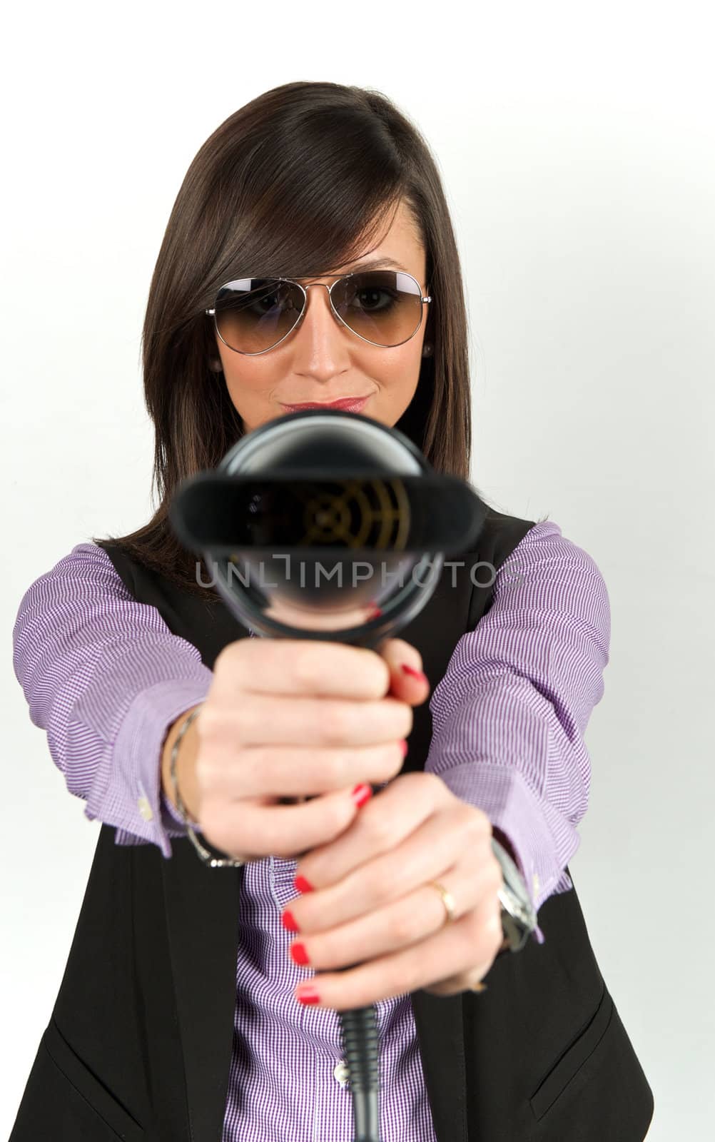 Hairdryer gun holding by a woman by swimnews