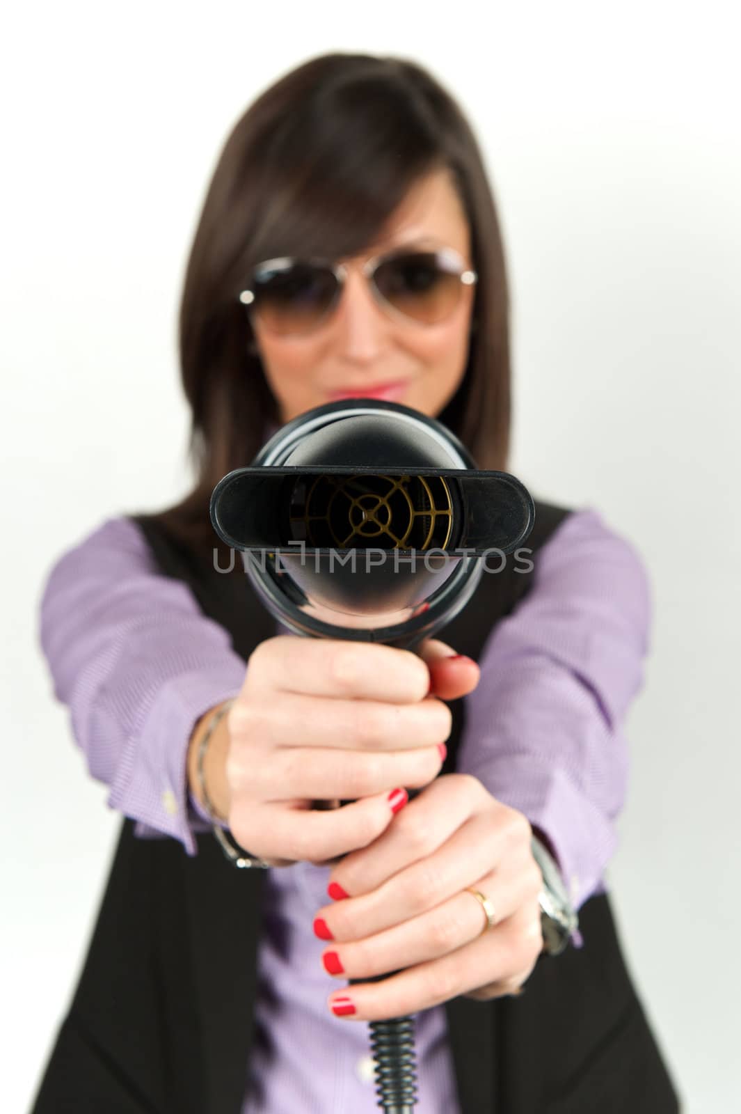 Young attractive woman with hairdryer 