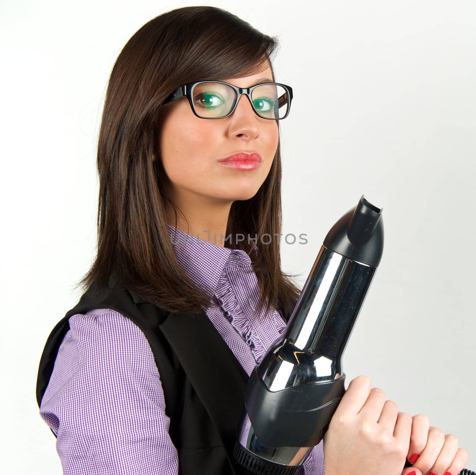 Young attractive woman with hairdryer 