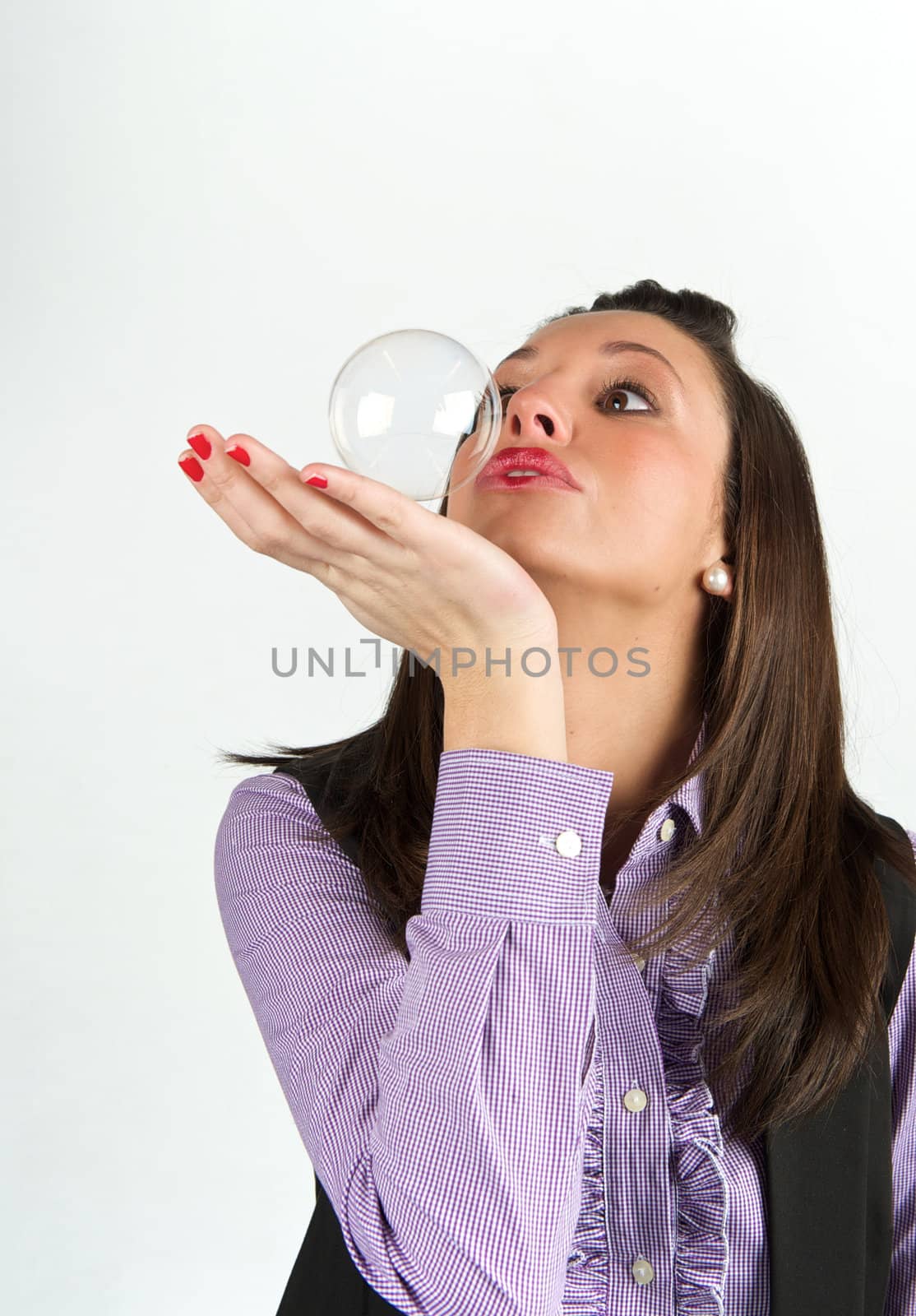 Pretty woman in a studio with bubbles by swimnews