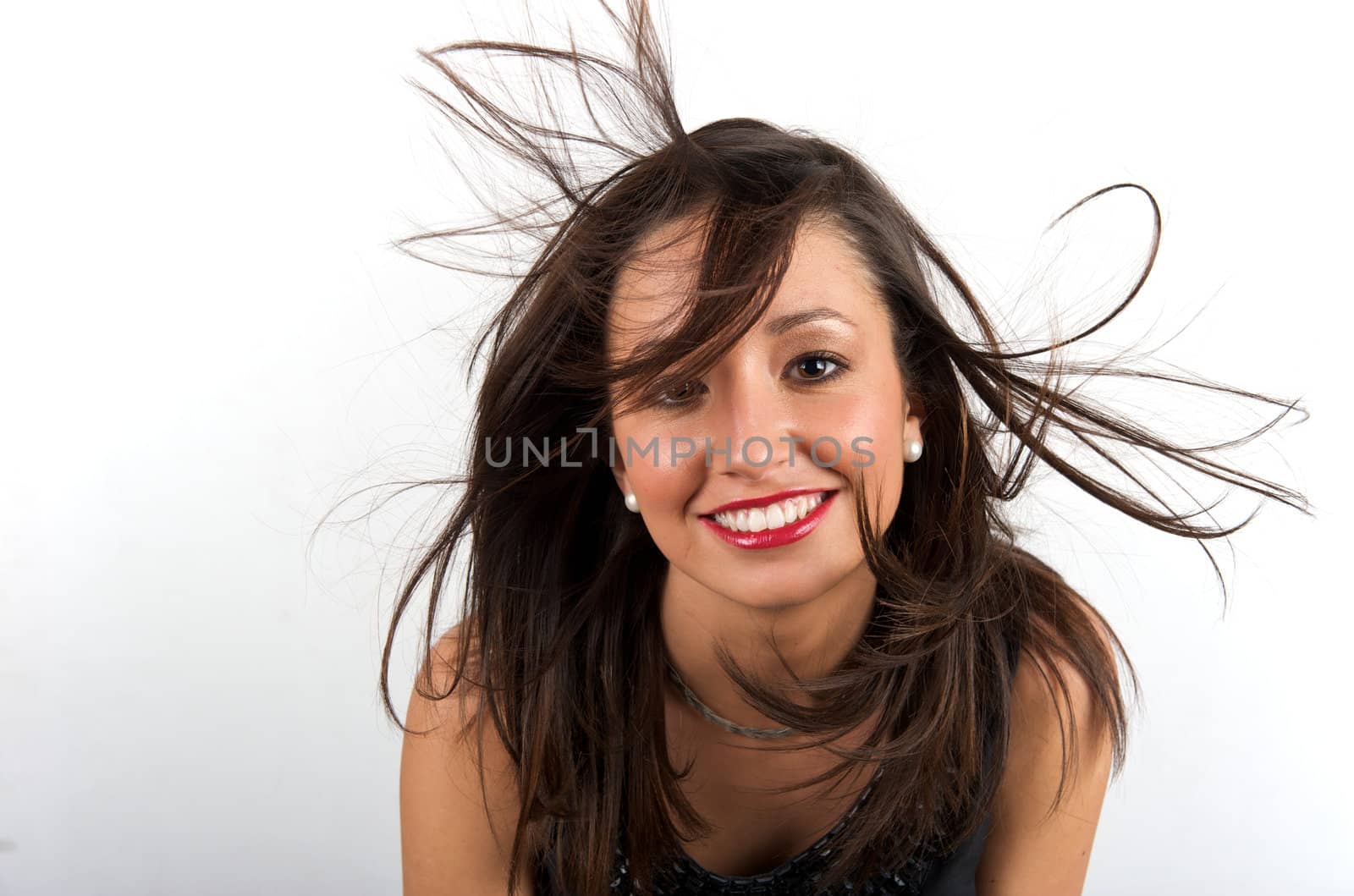 Pretty young woman posing with some bubbles around her