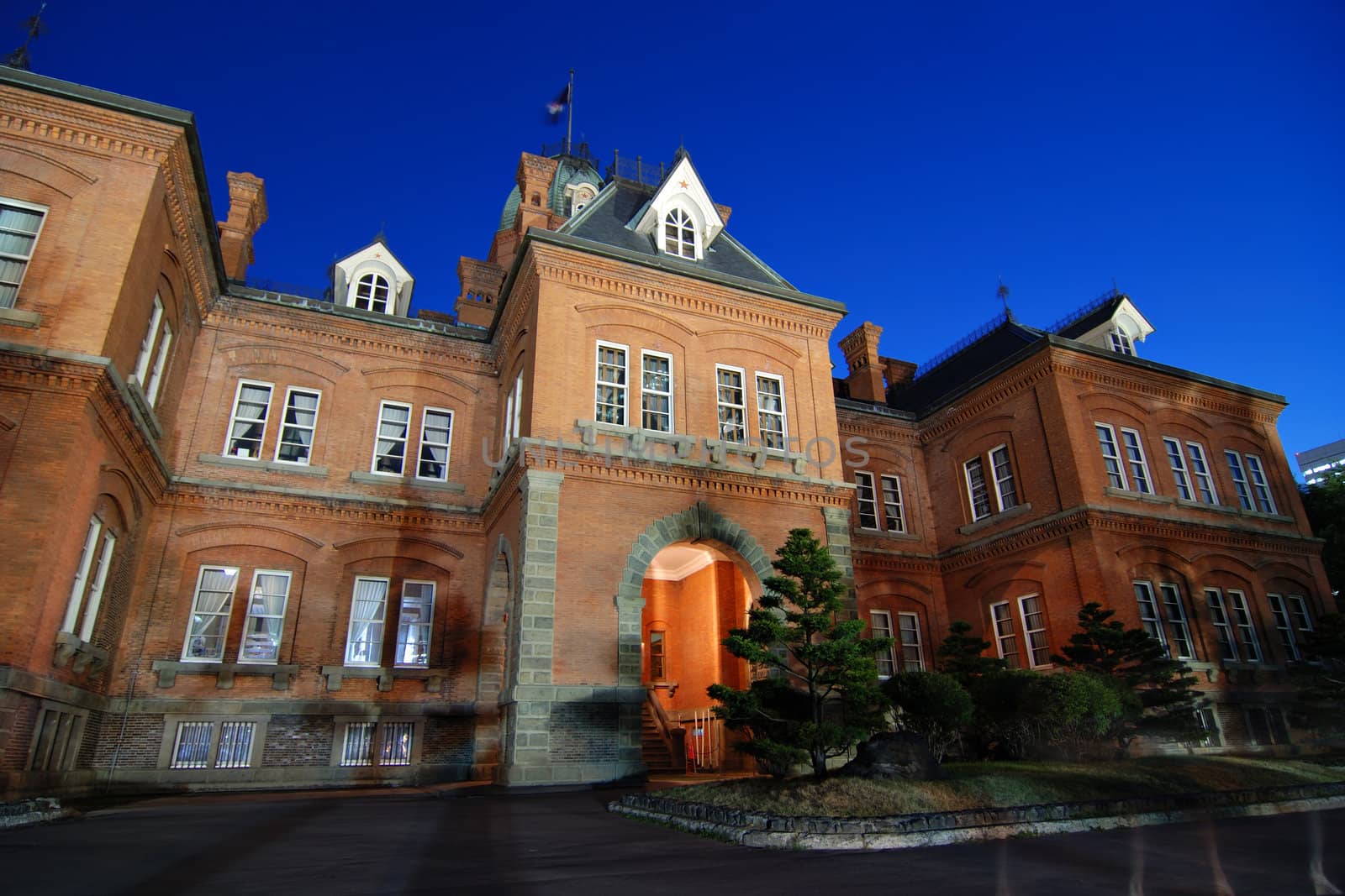 Historical building of Sapporo Government at twilight summer time with night illumination, Hokkaido, Japan