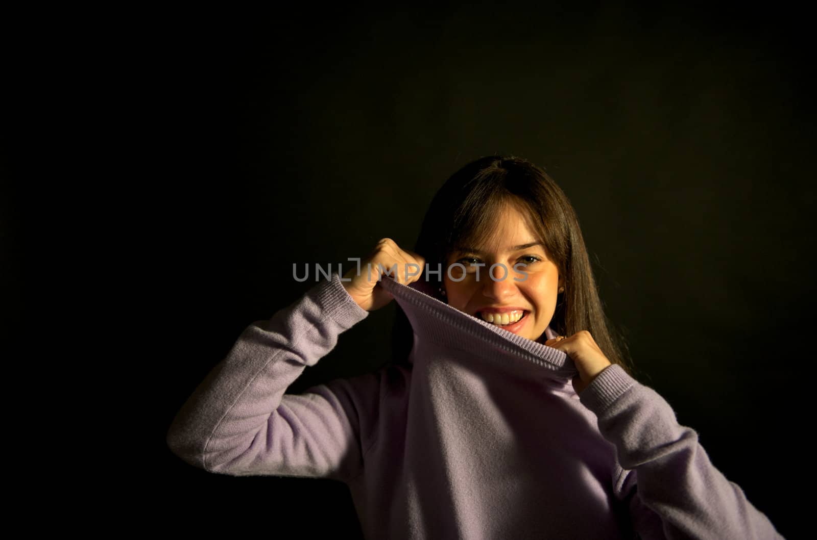 Pretty young woman posing with some bubbles around her