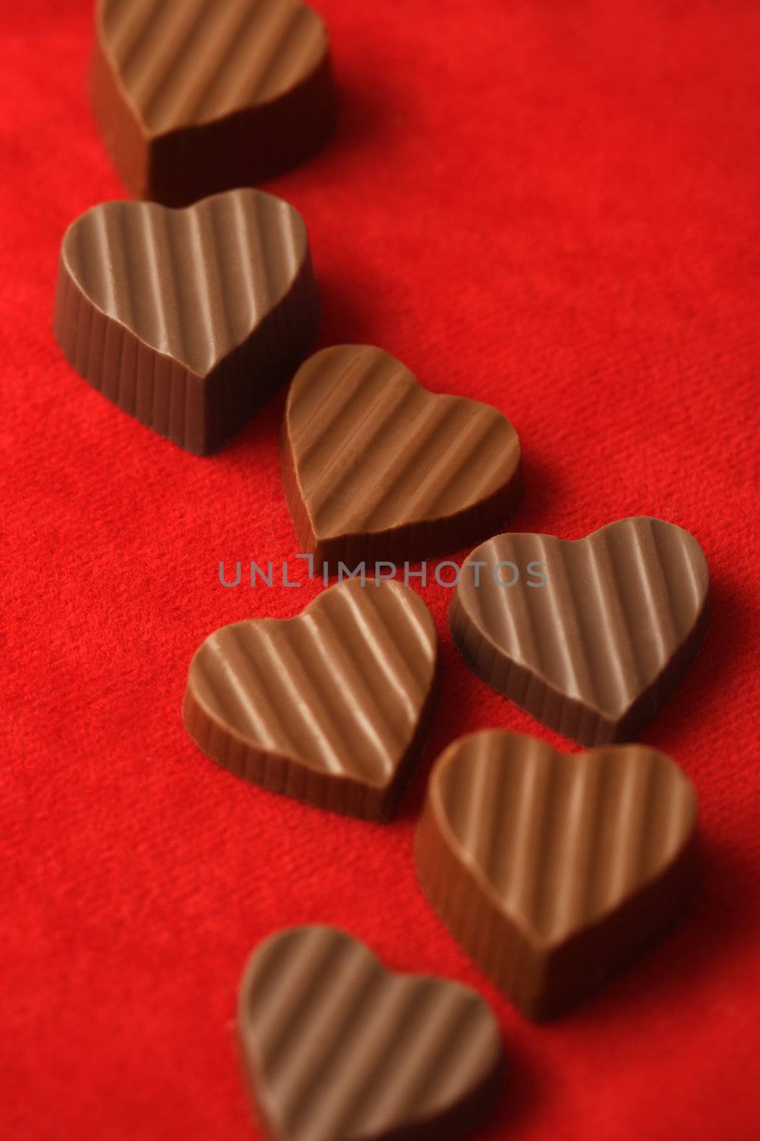 Delicious chocolates for Valentines day.  Shallow depth of field - focus through the middle of image.
