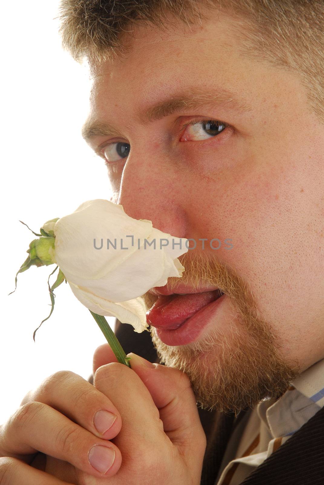 Adult man with white rose in his hands