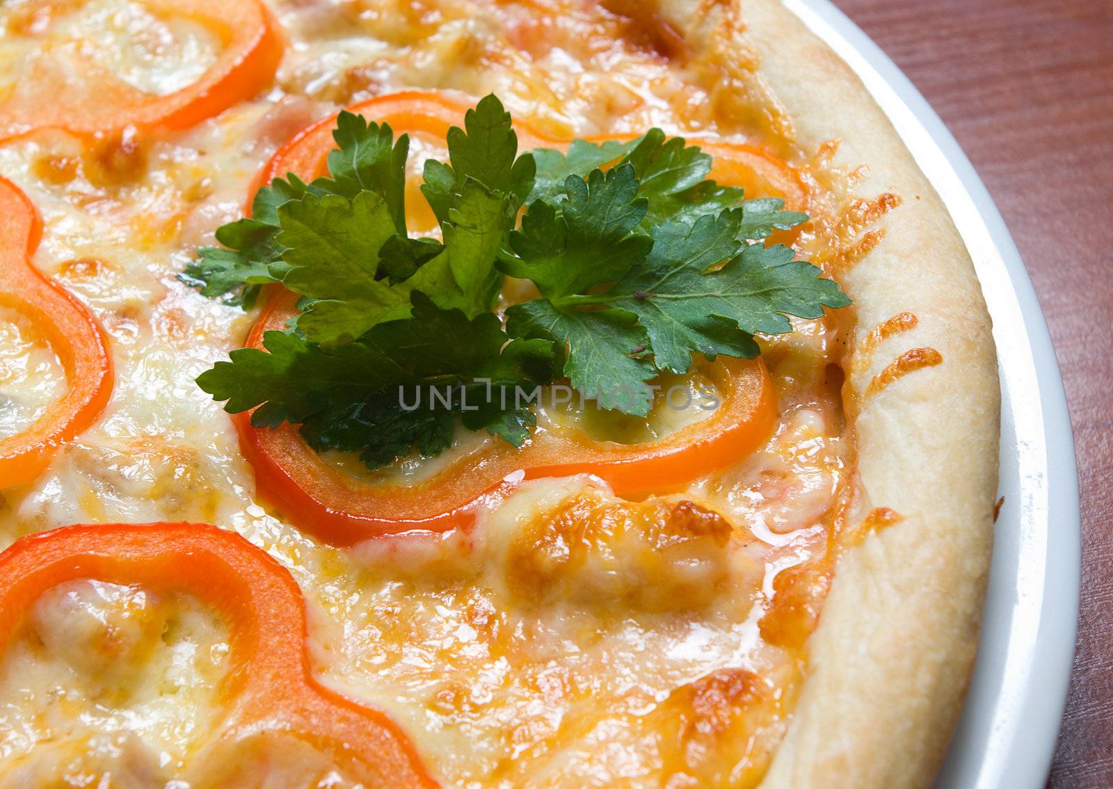 Tasty Italian pizza with paprika.Close-up 