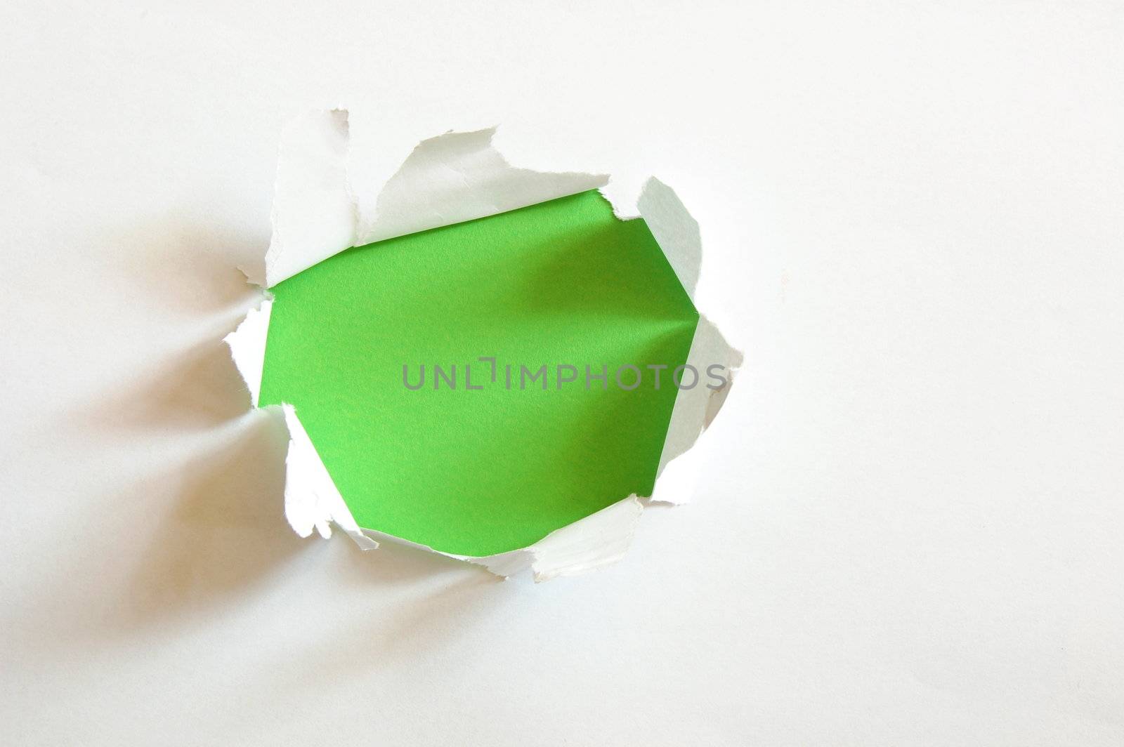 green hole with copyspace in empty sheet paper