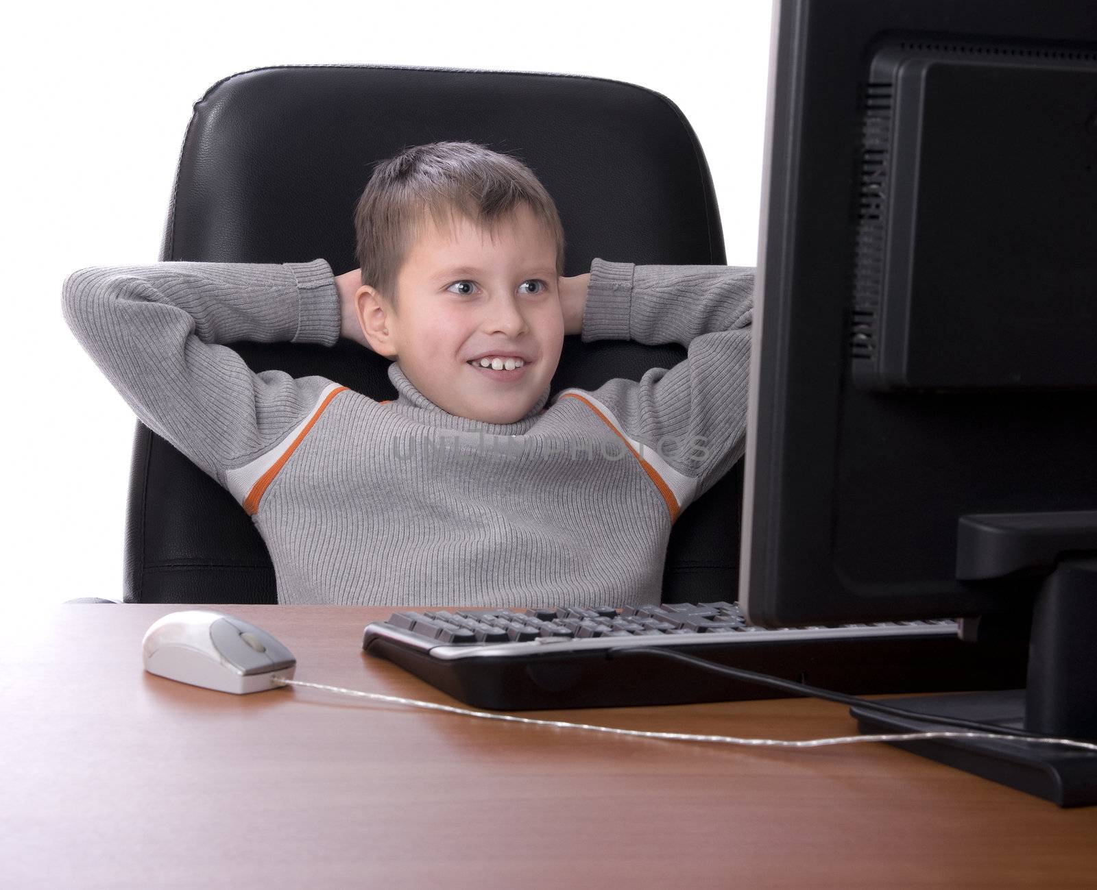 teenager with his feet up on a desk  by jordano