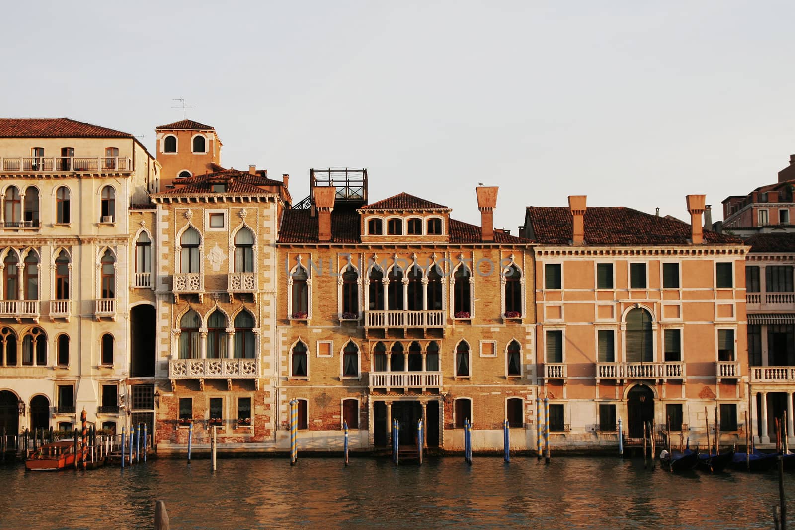 Venice, Italy - Typical Old Building Water Front Facade And Canal