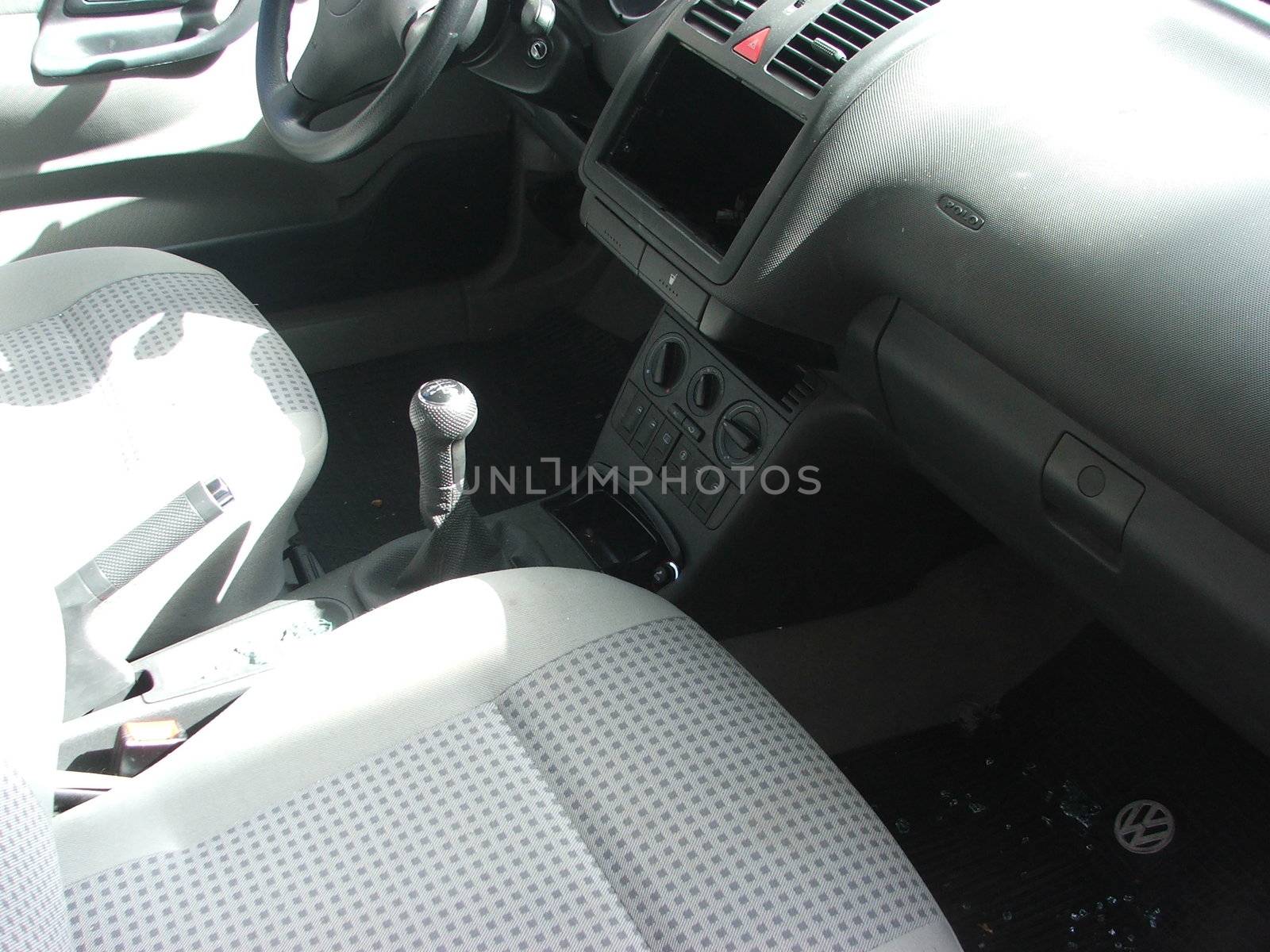 a car dash with a hole in place of the stereo, just robbed