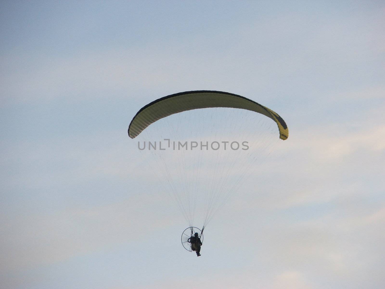 a guy with parachute and some engine