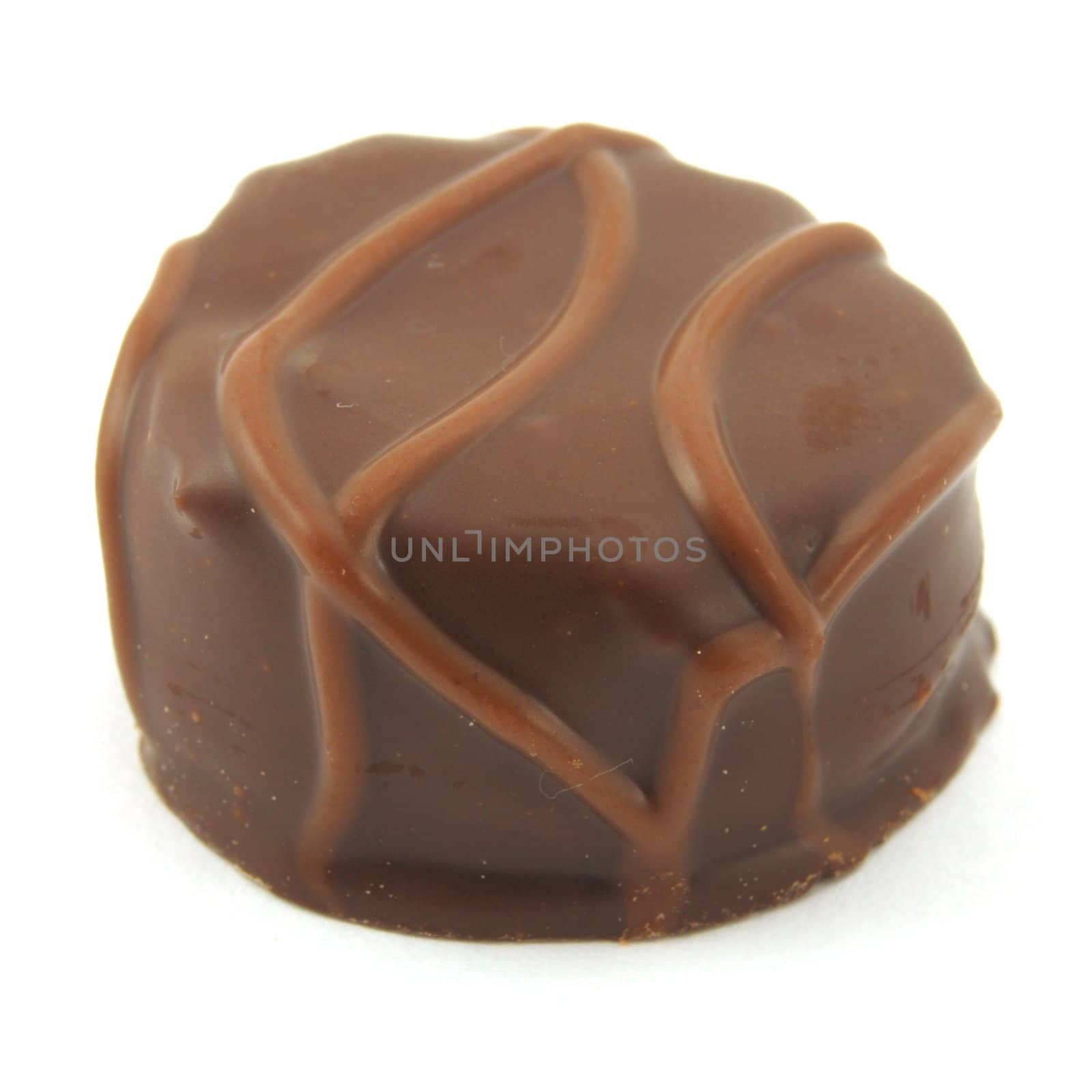 sweet chocolate praline isolated on white background