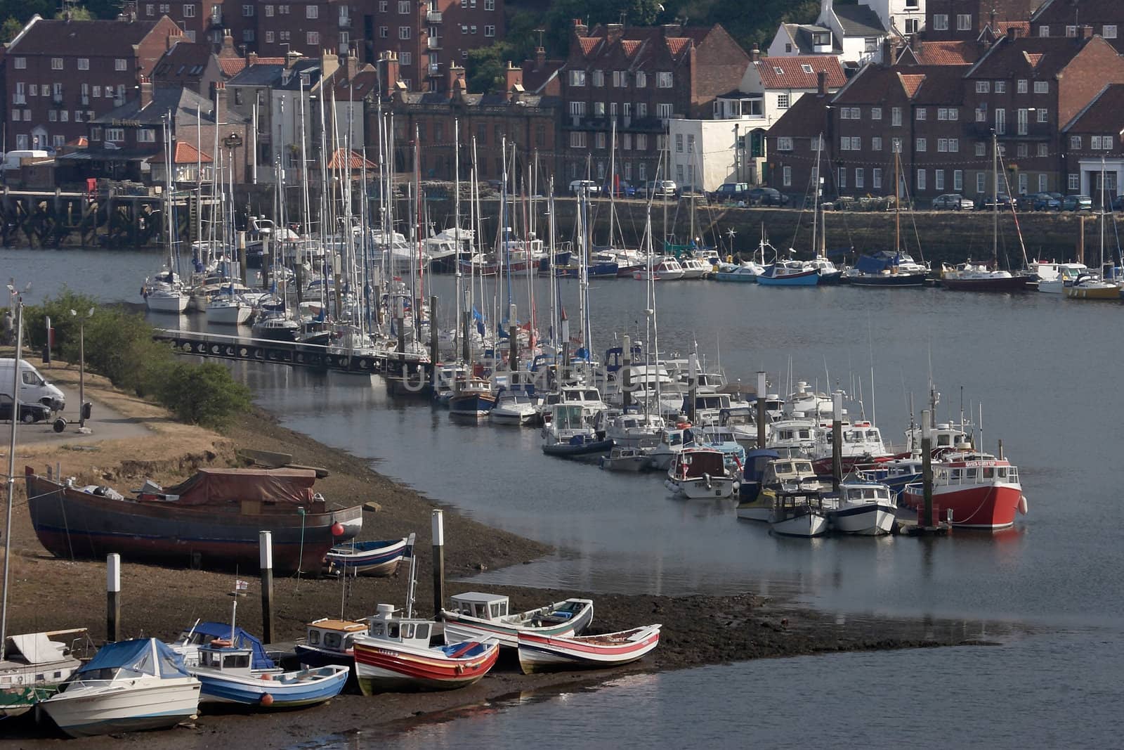 Moorings in the Estuary for small boats at Whitby, Yorkshire, England.