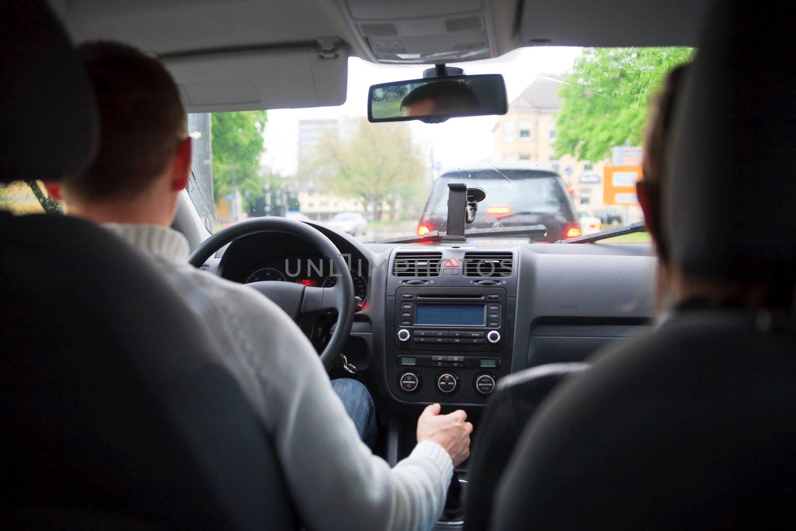 young driver driving concentrating a car