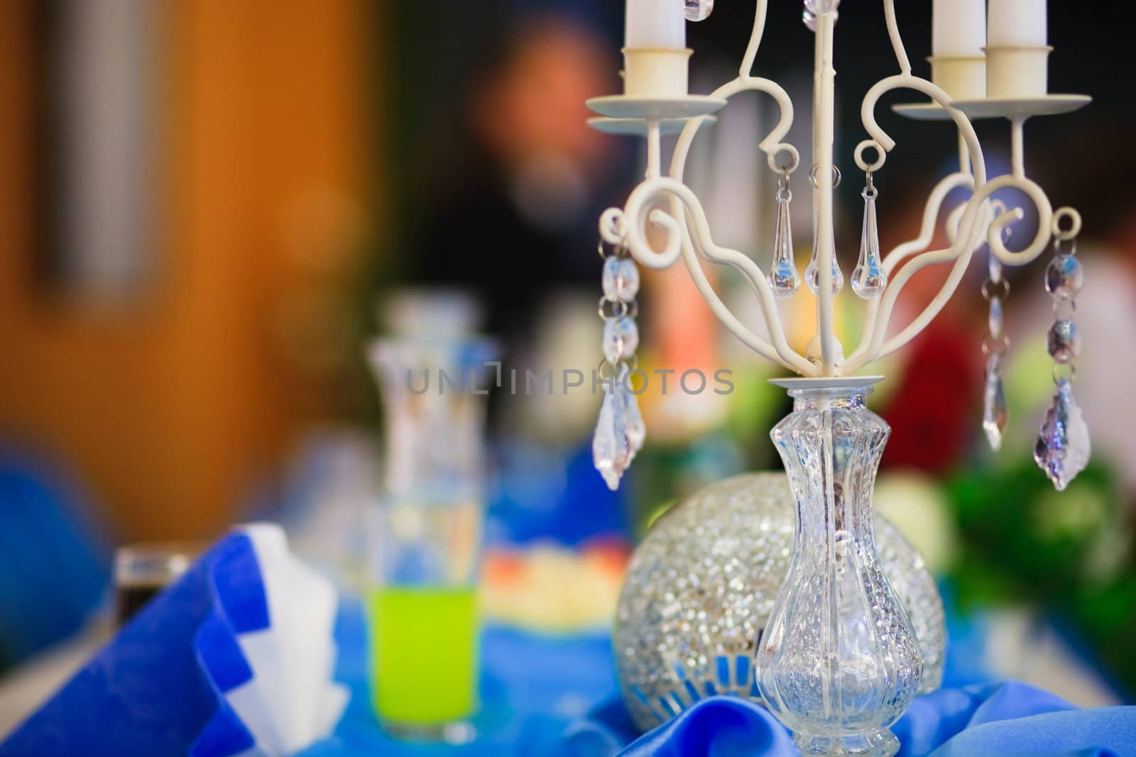 Wedding table set with glasses and small wrapped present