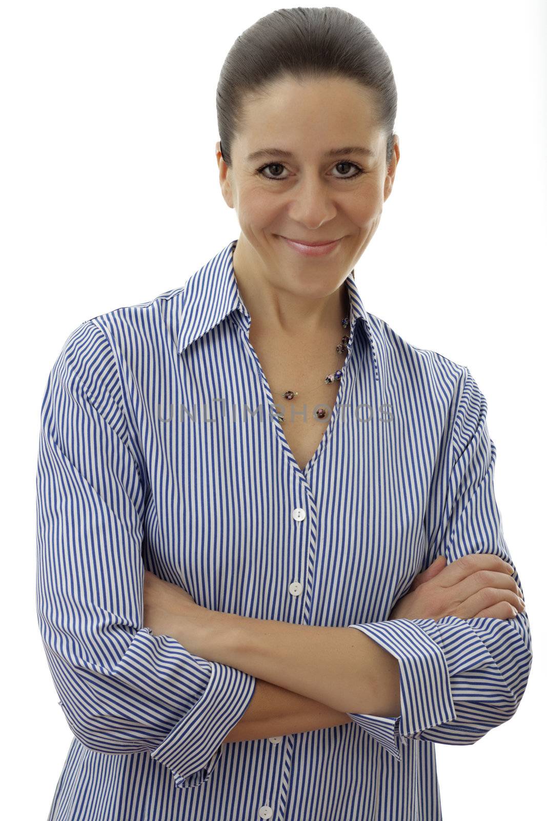 Single attractive businesswoman with arms crossed across her body looking forward on a white background