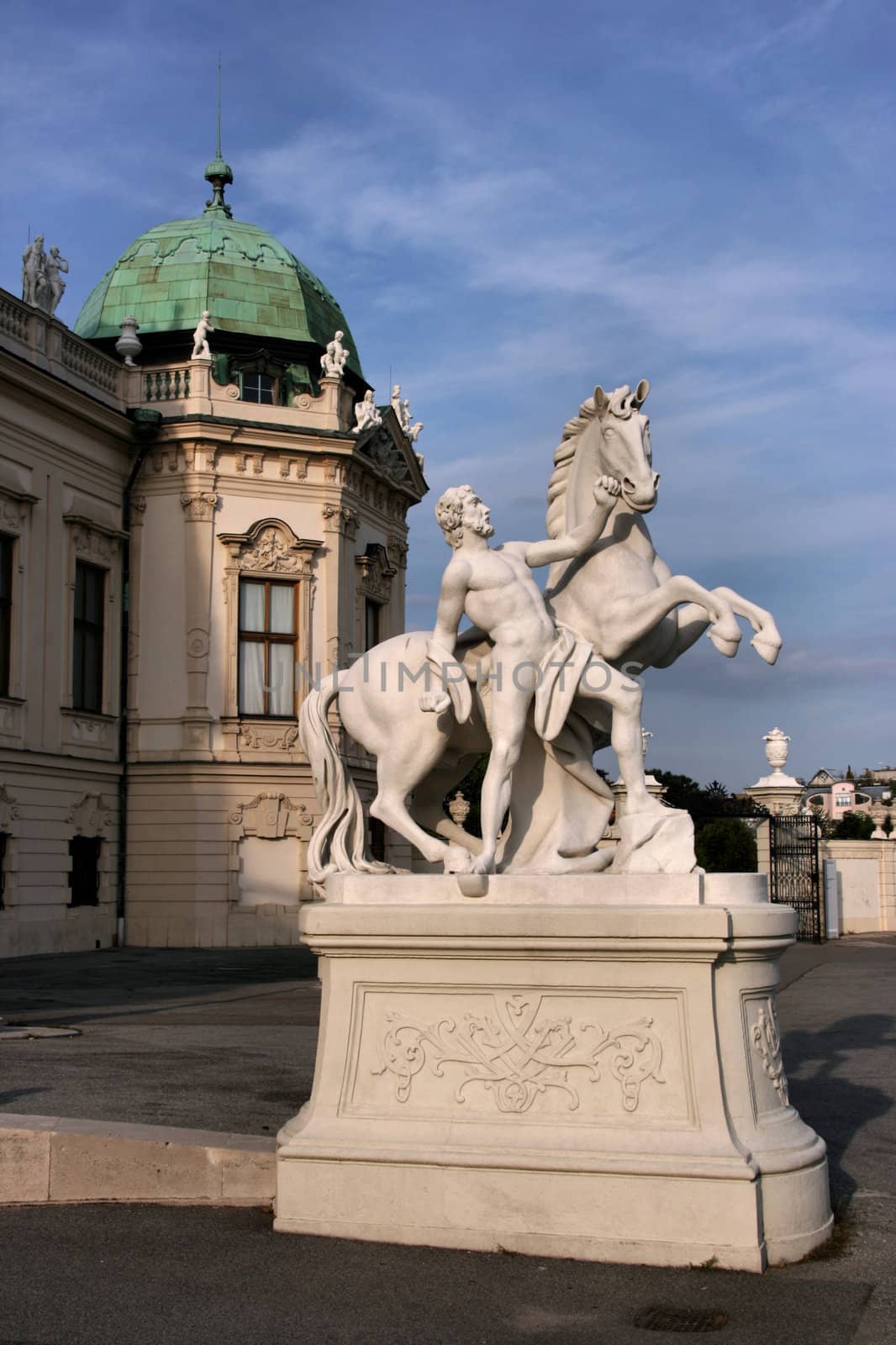 Statue of man with a horse next to Belvedere Castle in Vienna, Austria