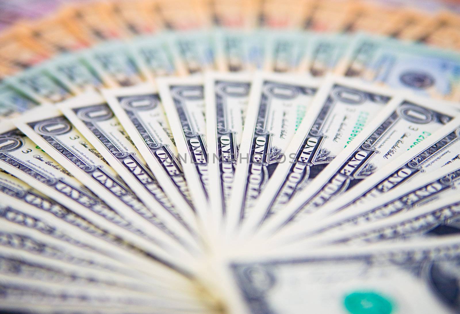 US banknotes on a fan of high-denomination european euro notes