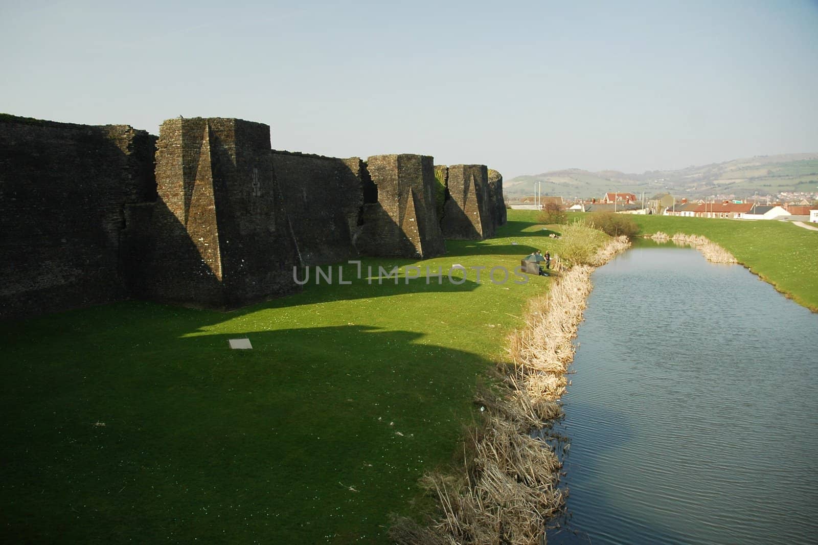 caerphilly castle with water, horizontally framed shot