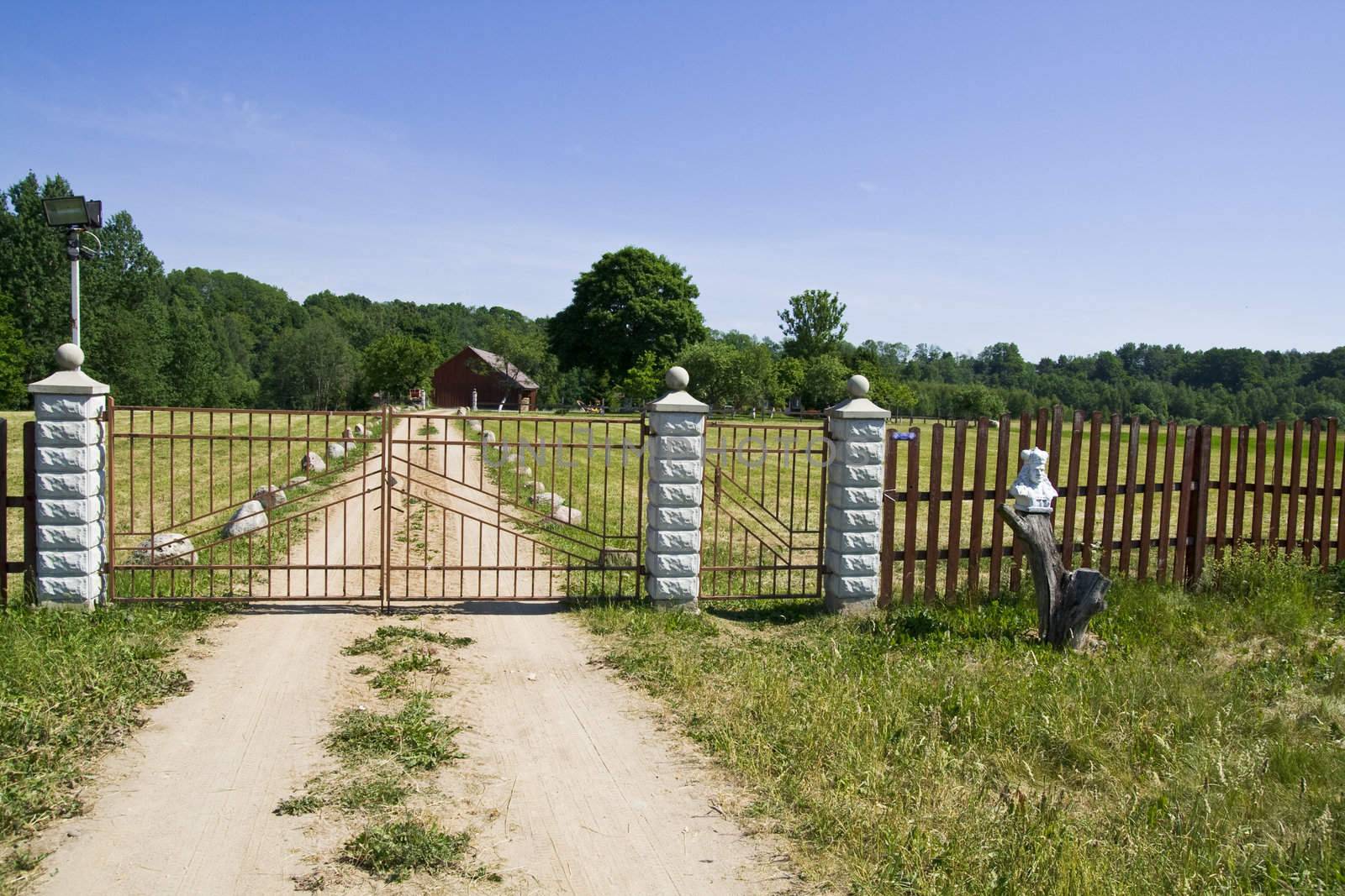 Spring day! - A farm gate and farm house in the Lithuania, Baltic States 