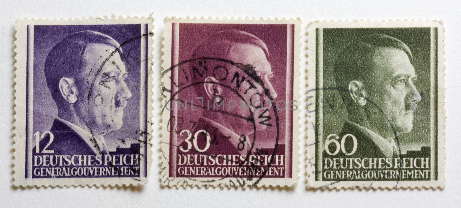 Adolf Hitler portrait on three German World War II post stamps issued and postmarked on the territory of occupied Poland (the General Government)