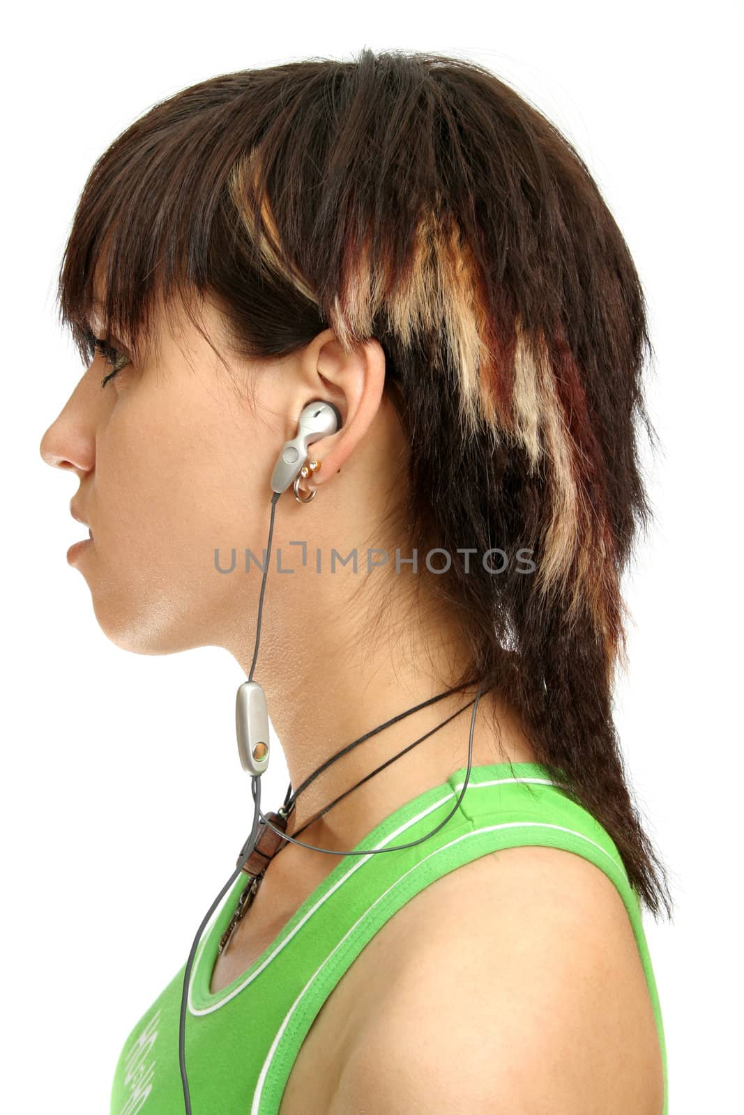 Young girl with headphones, isolated on white