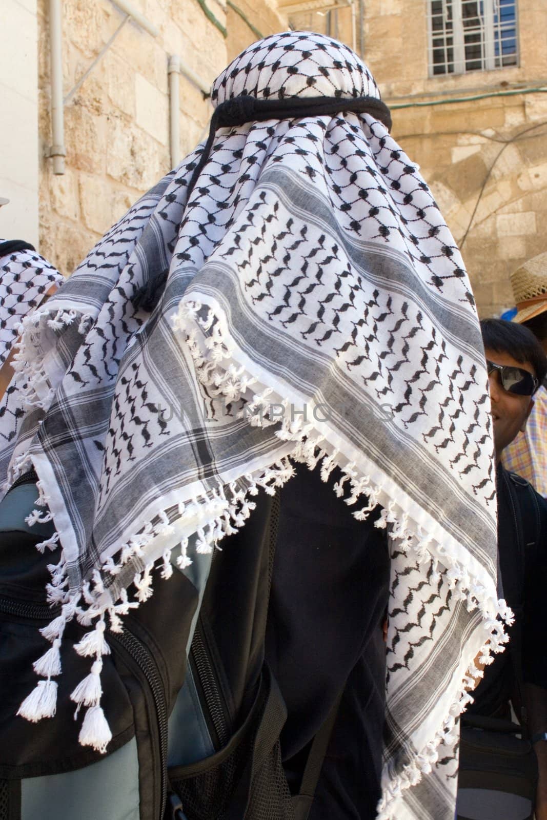 Palestinian man with traditional black and white keffiyeh in East Jerusalem