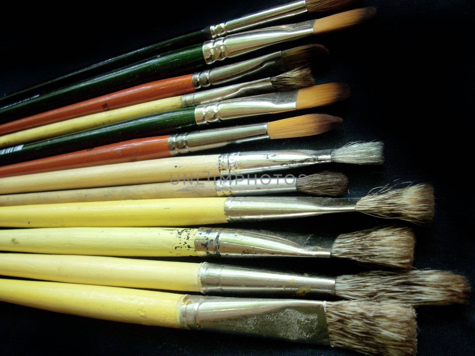 These are some artistic brushes on a black background