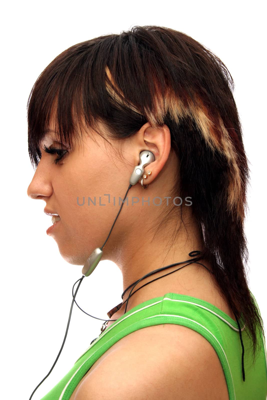 Young girl with headphones, isolated on white