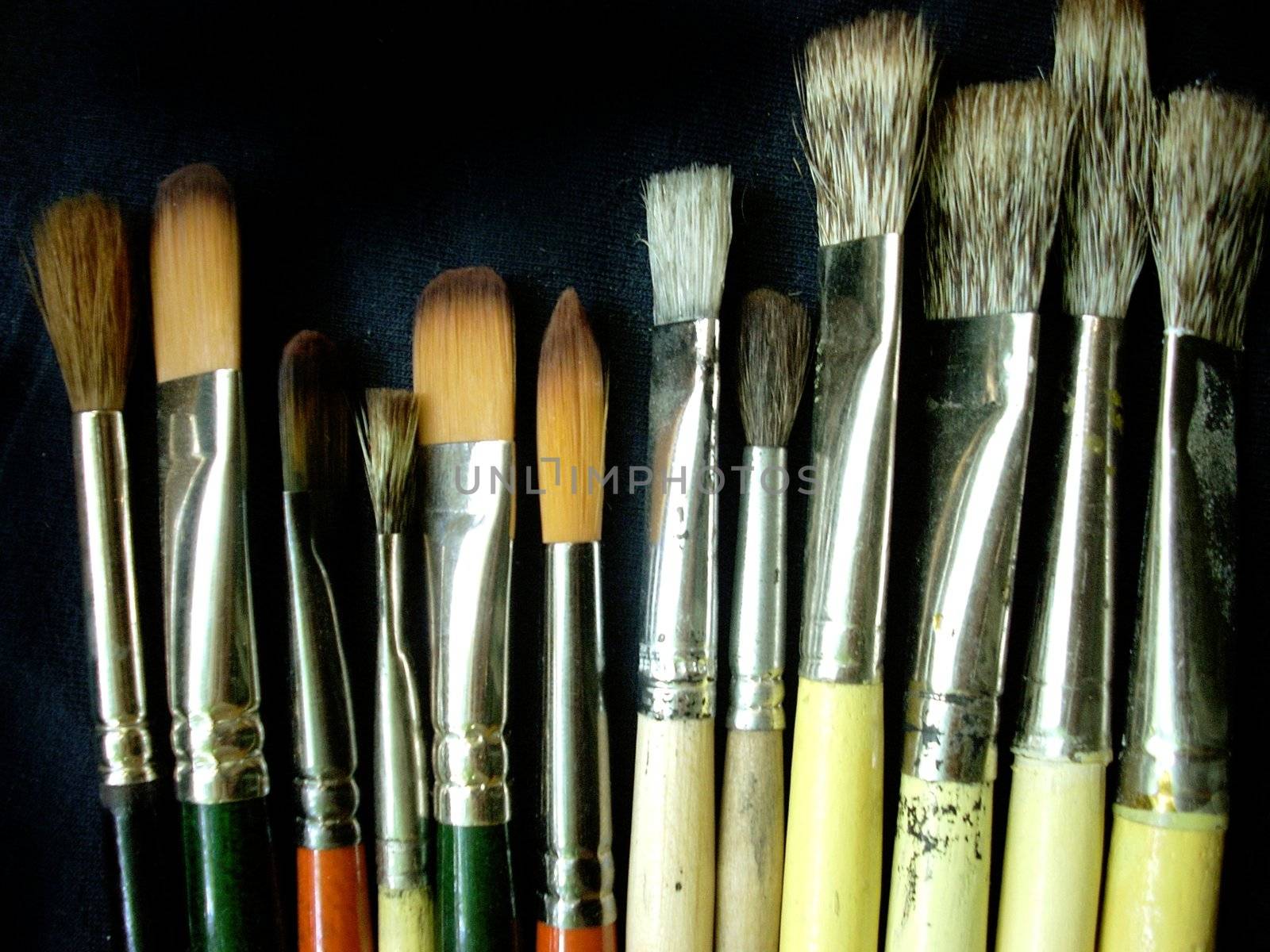 These are some artistic brushes on a black background