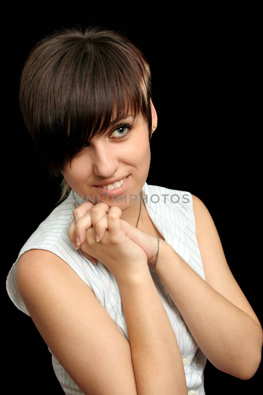 The young girl with expressive emotions, isolated on black background