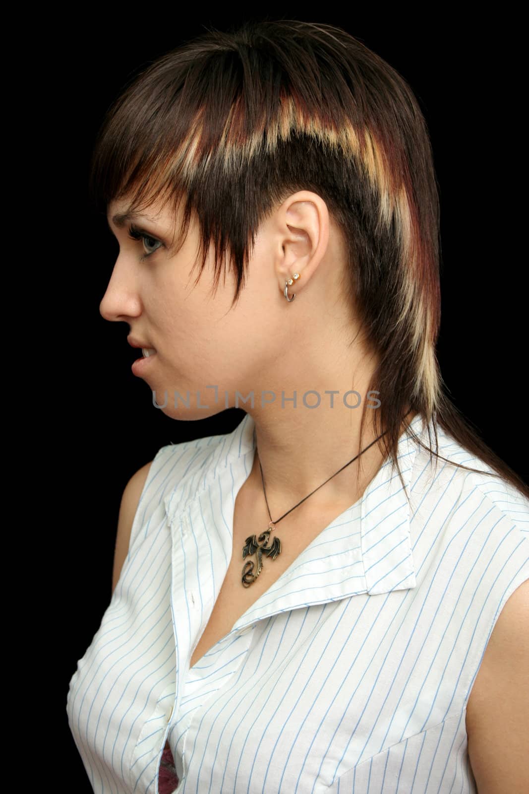 The young girl with expressive emotions, isolated on black background