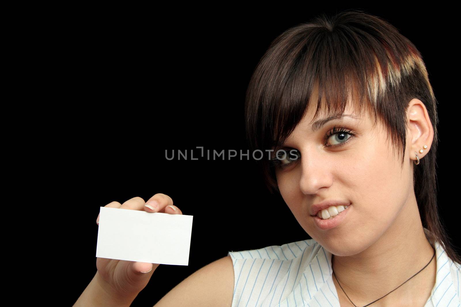 Girl with notecard, isolated on black