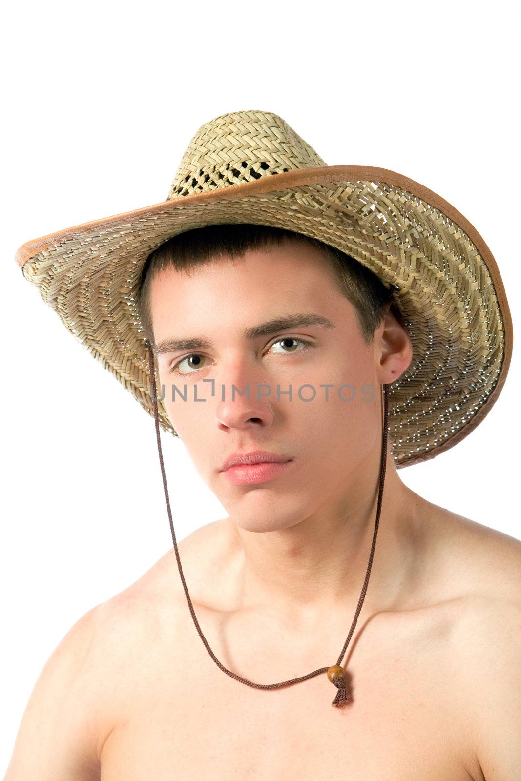 The beautiful young man in a straw hat
