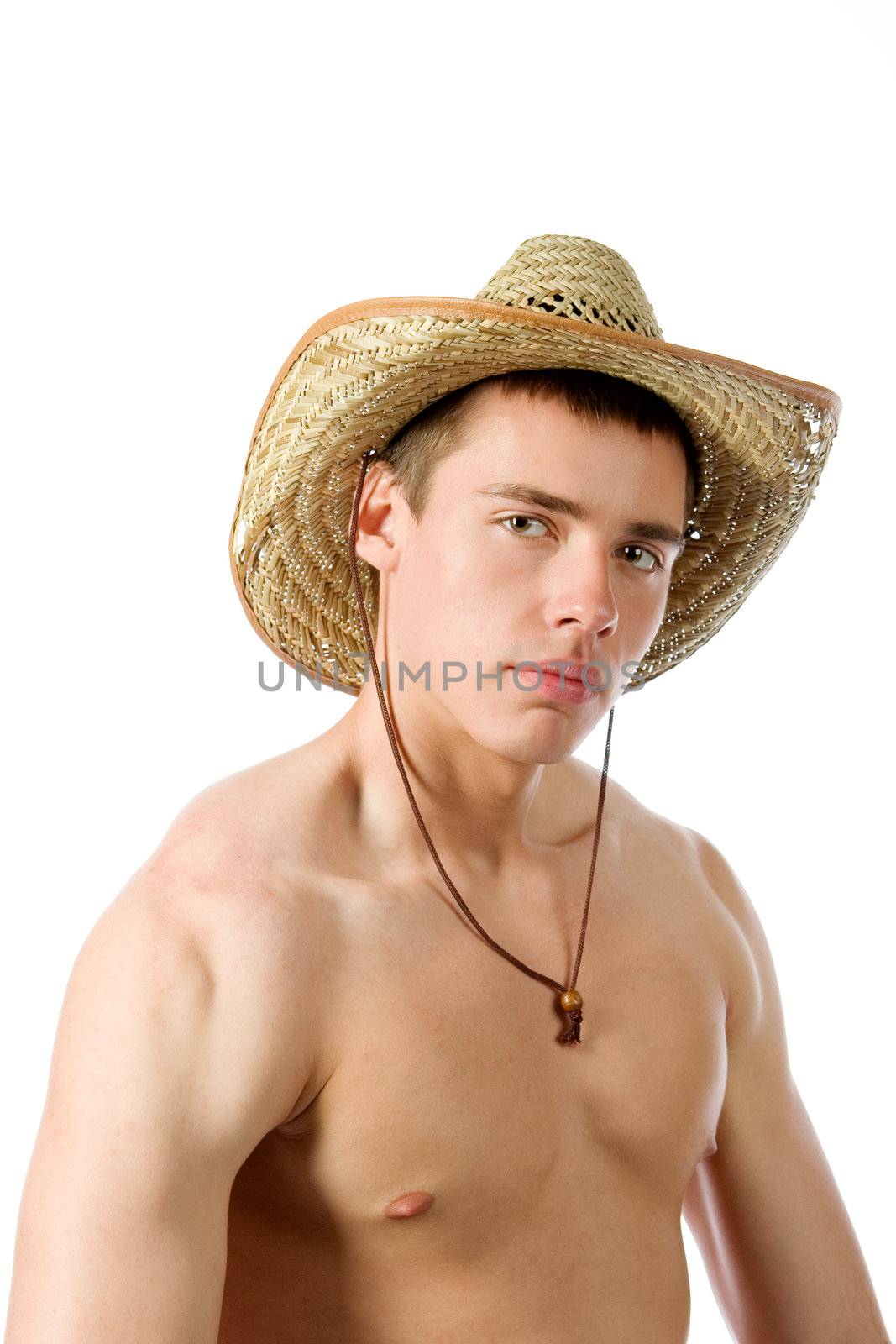 The beautiful young man in a straw hat
