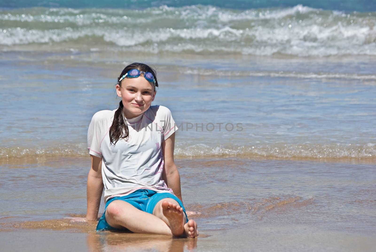 teenage girl on beach by clearviewstock